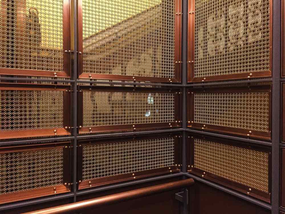 The retro charm of architectural brass woven wire mesh in interiors ...