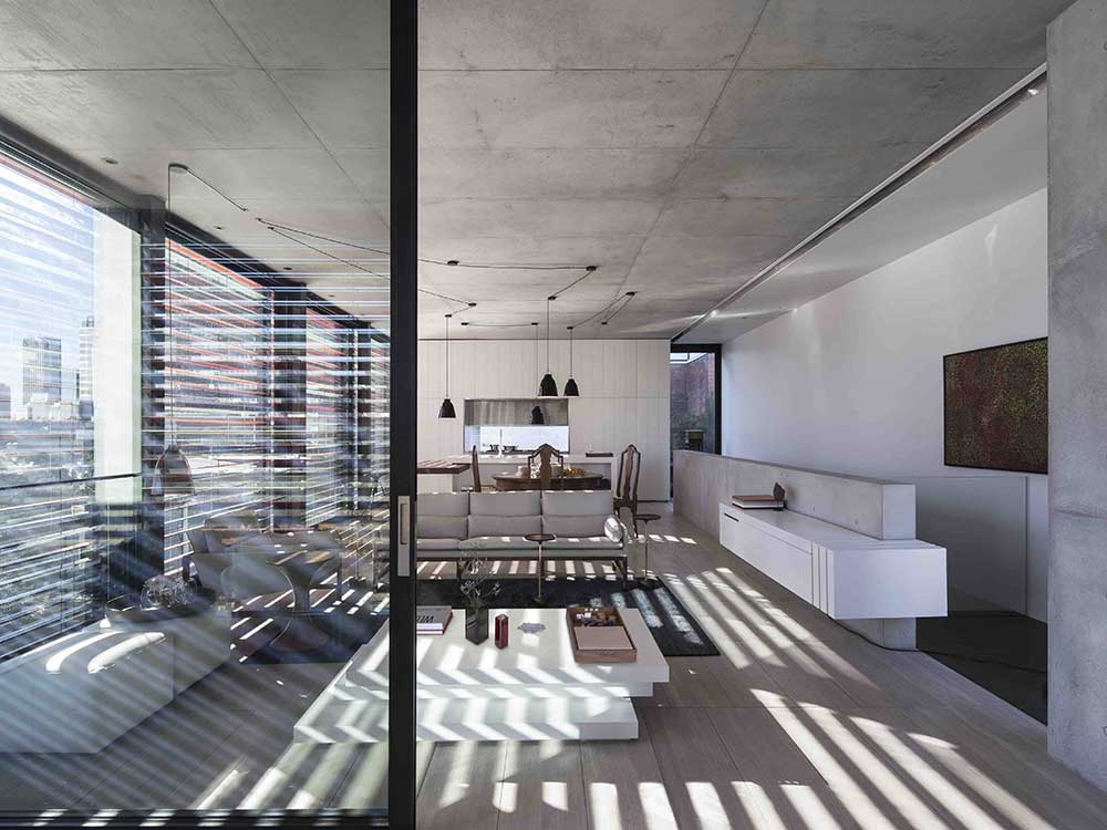 Modern inner city concrete home references local history and character ...