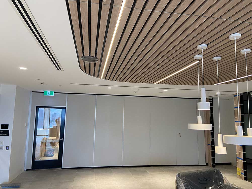 Operable Reception Series 100 remote stacking operable wall makes office reception space ...